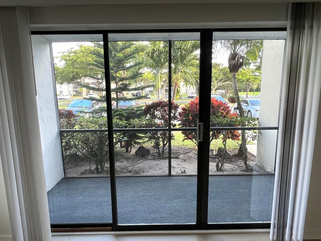 Covered & screened balcony