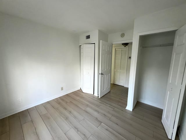 Guest Bedroom with two small closets
