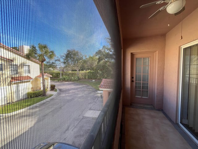 Covered and screened balcony