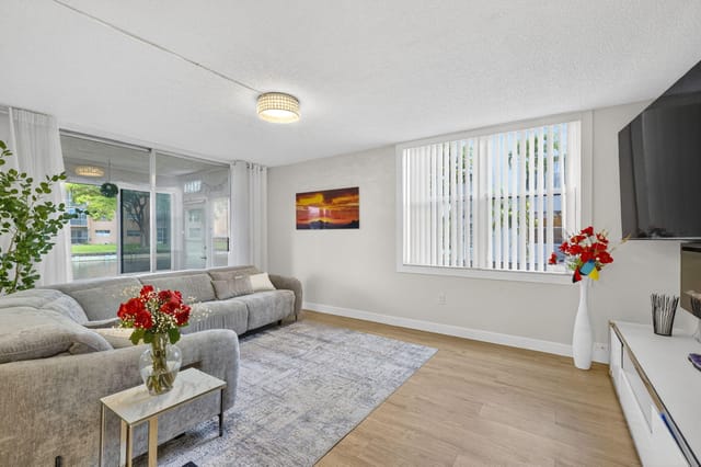 Living Room - 9081 Lime Bay Blvd 115