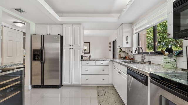 219 Wimbledon Lakes Drive, Plantation, FL 33324